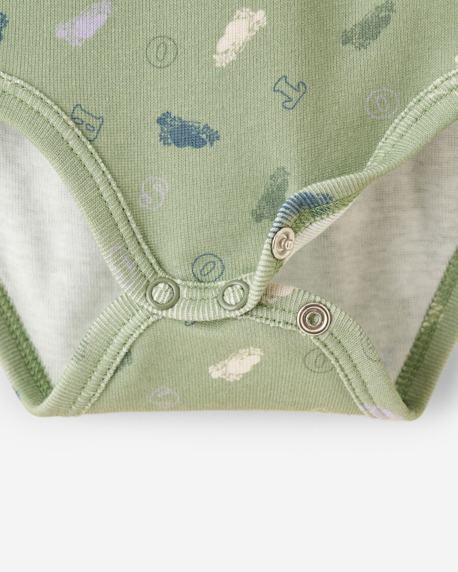 primer body para bebé roots