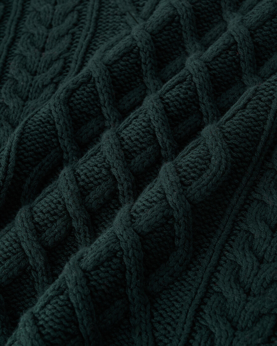 suéter de punto cable