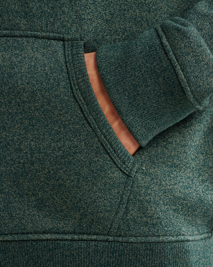 sudadera con capucha y cremallera completa con apliques roots