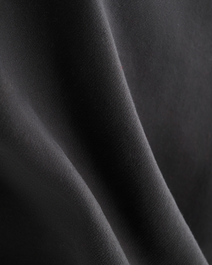cuello redondo con apliques de cuadros